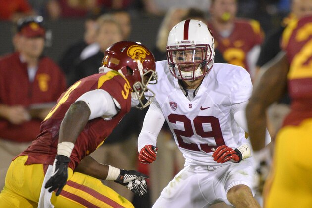 Stanford safety Ed Reynolds, right, goes up against Southern California wide receiver Marqise Lee during the second half of an NCAA college football game, Saturday, Nov. 16, 2013, in Los Angeles. USC won 20-17. (AP Photo/Mark J. Terrill)