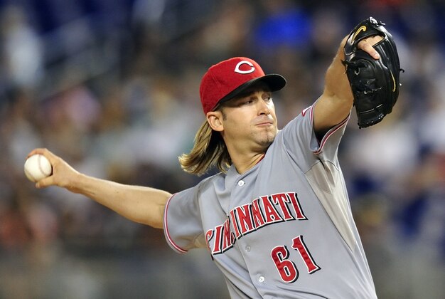 Sept 14, 2012; Miami, FL, USA; Cincinnati Reds starting pitcher Bronson Arroyo (61) throws against the Miami Marlins during the first inning at Marlins Park. Mandatory Credit: Steve Mitchell-USA TODAY Sports