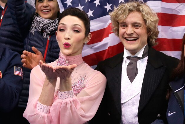 SOCHI, RUSSIA - FEBRUARY 08:  Meryl Davis and Charlie White of the United States wait for their score during the Figure Skating Team Ice Dance - Short Dance during day one of the Sochi 2014 Winter Olympics at Iceberg Skating Palace on February 8, 2014 in Sochi, Russia.  (Photo by Darren Cummings/Pool/Getty Images)