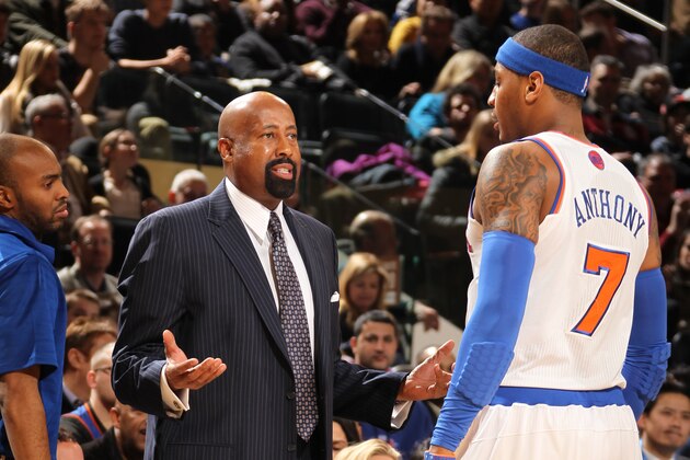 NEW YORK, NY - FEBRUARY 2: Carmelo Anthony #7 of the New York Knicks talks to Head Coach Mike Woodson during the game against the Sacramento Kings on February 2, 2013 at Madison Square Garden in New York City.  NOTE TO USER: User expressly acknowledges and agrees that, by downloading and or using this photograph, User is consenting to the terms and conditions of the Getty Images License Agreement. Mandatory Copyright Notice: Copyright 2013 NBAE  (Photo by Nathaniel S. Butler/NBAE via Getty Images)