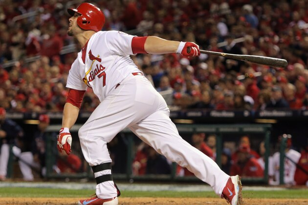 ST LOUIS, MO - OCTOBER 28:  Matt Holliday #7 of the St. Louis Cardinals in action against the Boston Red Sox during Game Five of the 2013 World Series at Busch Stadium on October 28, 2013 in St Louis, Missouri.  (Photo by Elsa/Getty Images)