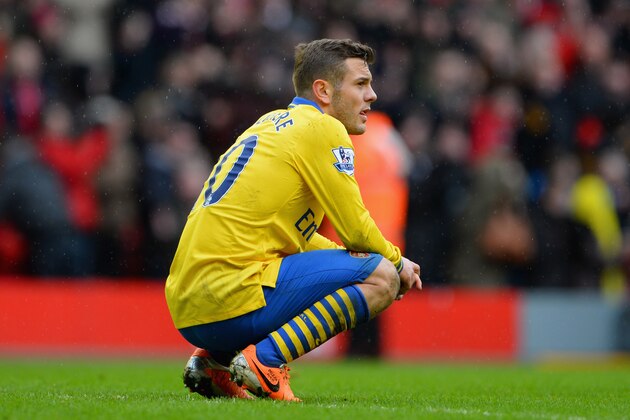 LIVERPOOL, ENGLAND - FEBRUARY 08:  Jack Wilshere of Arsenal looks dejected at the end of the Barclays Premier League match between Liverpool and Arsenal at Anfield on February 8, 2014 in Liverpool, England.  (Photo by Michael Regan/Getty Images)