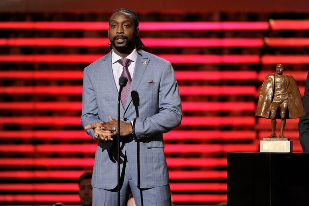 Charles Tillman of the Chicago Bears accepts the award for Walter Payton NFL Man of the Year, at the third annual NFL Honors at Radio City Music Hall on Saturday, Feb. 1, 2014, in New York. (Photo by Evan Agostini/Invision for NFL/AP Images)