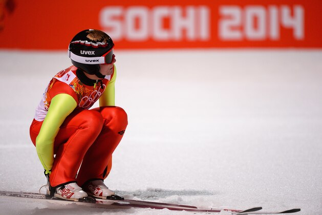 SOCHI, RUSSIA - FEBRUARY 09:  Jan Ziobro of Poland reacts after his jump during the Men's Normal Hill Individual Final round on day 2 of the Sochi 2014 Winter Olympics at the RusSki Gorki Ski Jumping Center on February 9, 2014 in Sochi, Russia.  (Photo by Lars Baron/Getty Images)