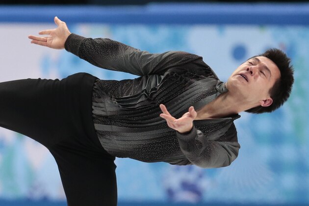 Patrick Chan of Canada competes in the men's team short program figure skating competition at the Iceberg Skating Palace during the 2014 Winter Olympics, Thursday, Feb. 6, 2014, in Sochi, Russia. (AP Photo/Ivan Sekretarev)