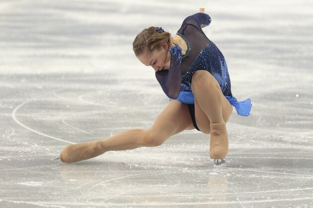 Yulia Lipnitskaya of Russia competes in the women's team short program figure skating competition at the Iceberg Skating Palace during the 2014 Winter Olympics, Saturday, Feb. 8, 2014, in Sochi, Russia. (AP Photo/Ivan Sekretarev)