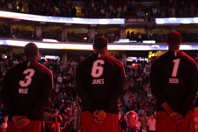 Miami Heat's Dwyane Wade, from left, LeBron James and Chris Bosh line up before an NBA basketball game against the Philadelphia 76ers, Friday, Jan. 17, 2014, in Philadelphia. (AP Photo/Matt Slocum)