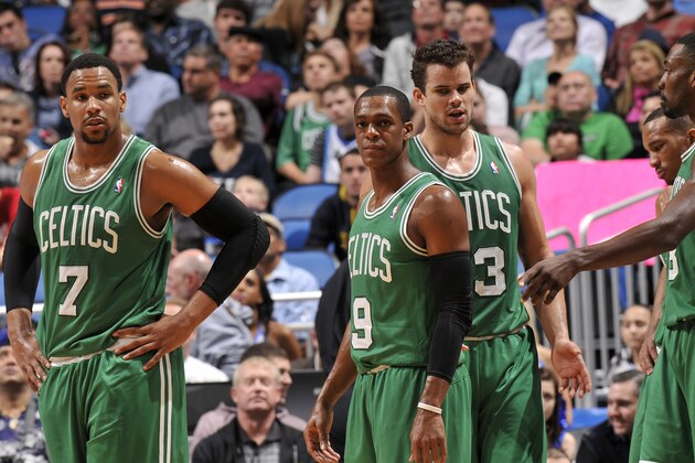 ORLANDO, FL - JANUARY 19: Rajon Rondo #9 of the Boston Celtics looks on with his teammates against the Orlando Magic during the game on January 19, 2014 at Amway Center in Orlando, Florida. NOTE TO USER: User expressly acknowledges and agrees that, by downloading and or using this photograph, User is consenting to the terms and conditions of the Getty Images License Agreement. Mandatory Copyright Notice: Copyright 2014 NBAE  (Photo by Fernando Medina/NBAE via Getty Images)