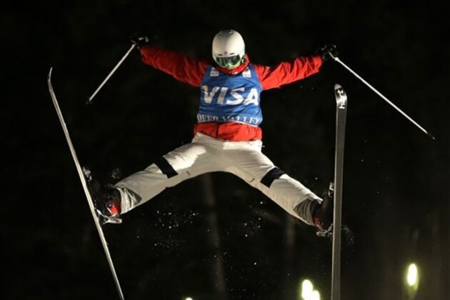 Patrick Deneen competes in the men's dual moguls event during World Cup freestyle skiing competition on Saturday, Feb. 2, 2013, at Deer Valley resort, in Park City, Utah. Deneen came in second place. (AP Photo/Rick Bowmer)