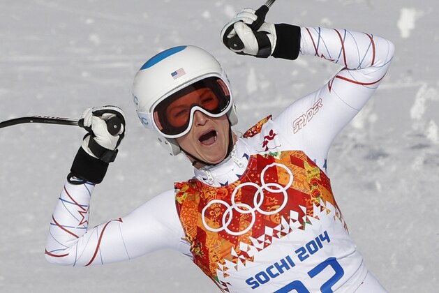 United States' Julia Mancuso celebrates after finishing the downhill portion of the women's supercombined at the Sochi 2014 Winter Olympics, Monday, Feb. 10, 2014, in Krasnaya Polyana, Russia.(AP Photo/Christophe Ena)