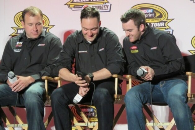 RCR teammates, Austin Dillon, Paul Menard and Ryan Newman share humor on stage.