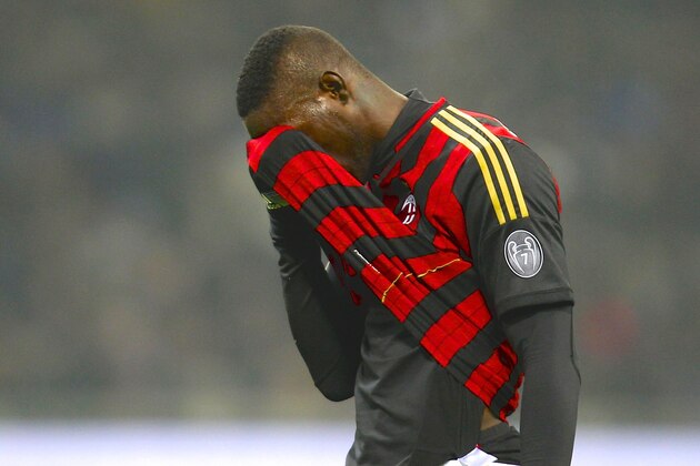 AC Milan forward Mario Balotelli stands during the Italian Cup soccer match between AC Milan and Udinese at the San Siro stadium in Milan, Italy, Wednesday, Jan. 22, 2014. (AP Photo/Antonio Calanni)