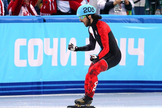 SOCHI, RUSSIA - FEBRUARY 10:  Gold medalist Charles Hamelin of Canada celebrates after wiining the Short Track Men's 1500m Final on day 3 of the Sochi 2014 Winter Olympics at Iceberg Skating Palace on February 10, 2014 in Sochi, Russia.  (Photo by Streeter Lecka/Getty Images)
