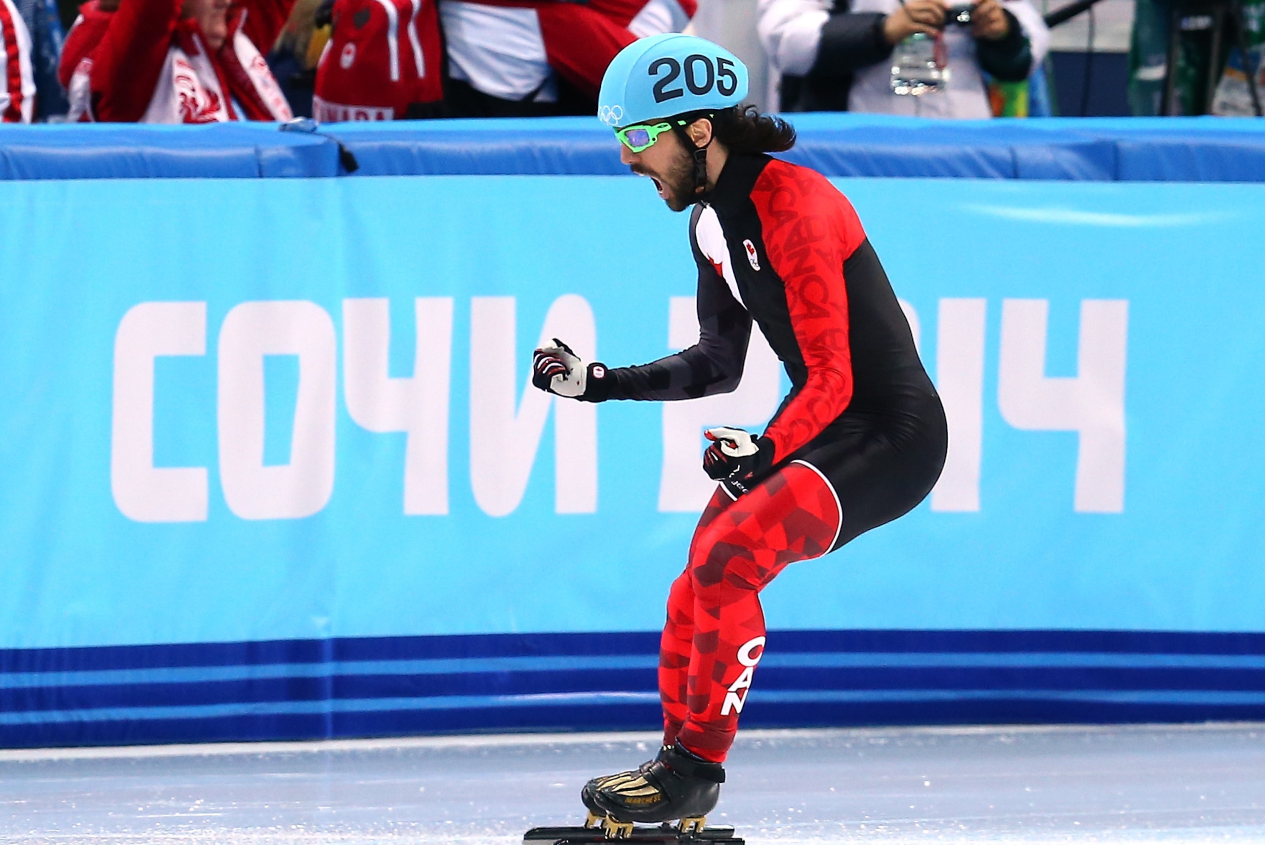 SOCHI, RUSSIA - FEBRUARY 10:  Gold medalist Charles Hamelin of Canada celebrates after wiining the Short Track Men's 1500m Final on day 3 of the Sochi 2014 Winter Olympics at Iceberg Skating Palace on February 10, 2014 in Sochi, Russia.  (Photo by Streeter Lecka/Getty Images)
