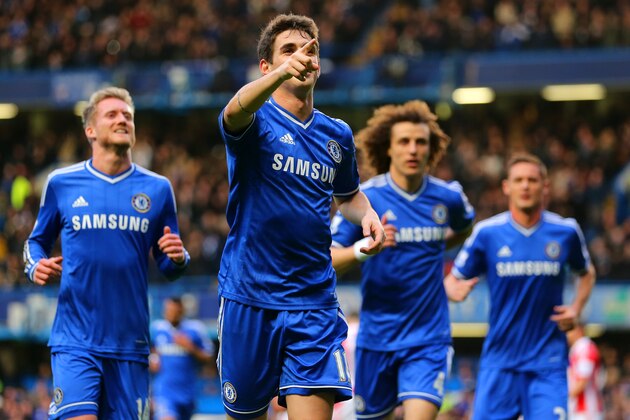 LONDON, ENGLAND - JANUARY 26:  Oscar of Chelsea celebrates scoring the first goal during the FA Cup Fourth Round between Chelsea and Stoke City at Stamford Bridge on January 26, 2014 in London, England.  (Photo by Ian Walton/Getty Images)