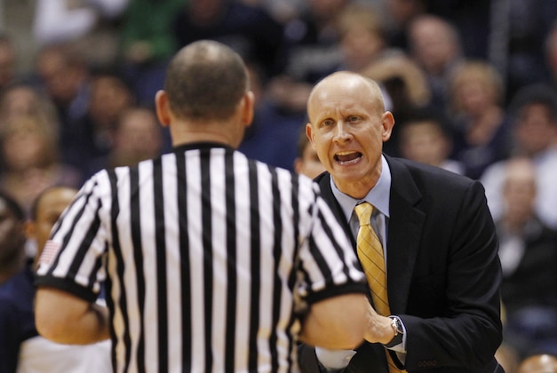Feb 8, 2014; Cincinnati, OH, USA; Xavier Musketeers head coach Chris Mack argues a call during the second half against the Providence Friars at the Cintas Center. Xavier defeated Providence 59-53. Mandatory Credit: Frank Victores-USA TODAY Sports