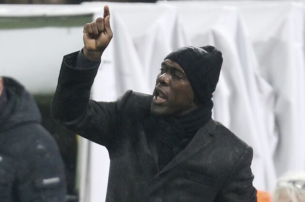 AC Milan coach Clarence Seedorf, of the Netherlands, gestures during the Serie A soccer match between AC Milan and Torino at the San Siro stadium in Milan, Italy, Saturday, Feb. 1, 2014. (AP Photo/Antonio Calanni)