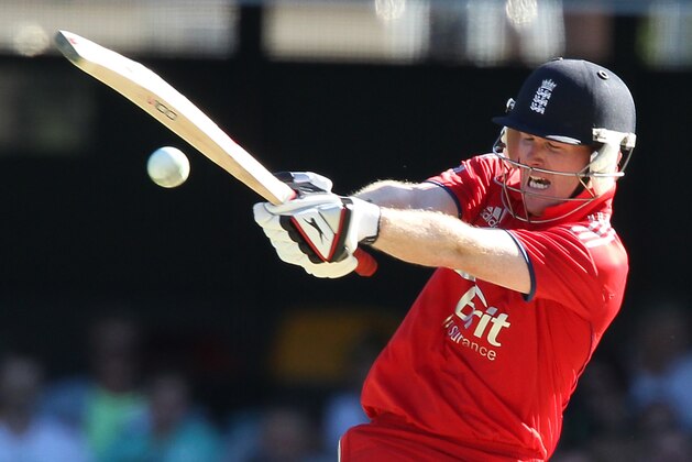 England's Eoin Morgan plays a shot against Australia during their second One Day International cricket match at the Gabba cricket ground in Brisbane, Australia, Friday, Jan. 17, 2014. (AP Photo/Tertius Pickard)