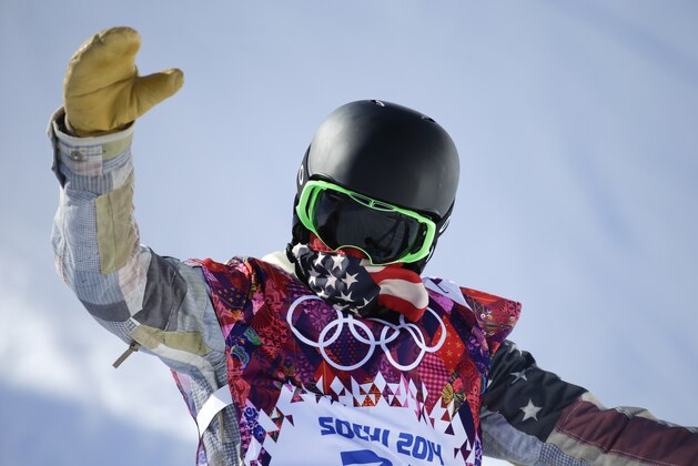 Shaun White of the United States lands from a jump during a training session for the men's snowboard halfpipe at the 2014 Winter Olympics, Saturday, Feb. 8, 2014, in Krasnaya Polyana, Russia. (AP Photo/Jae C. Hong)