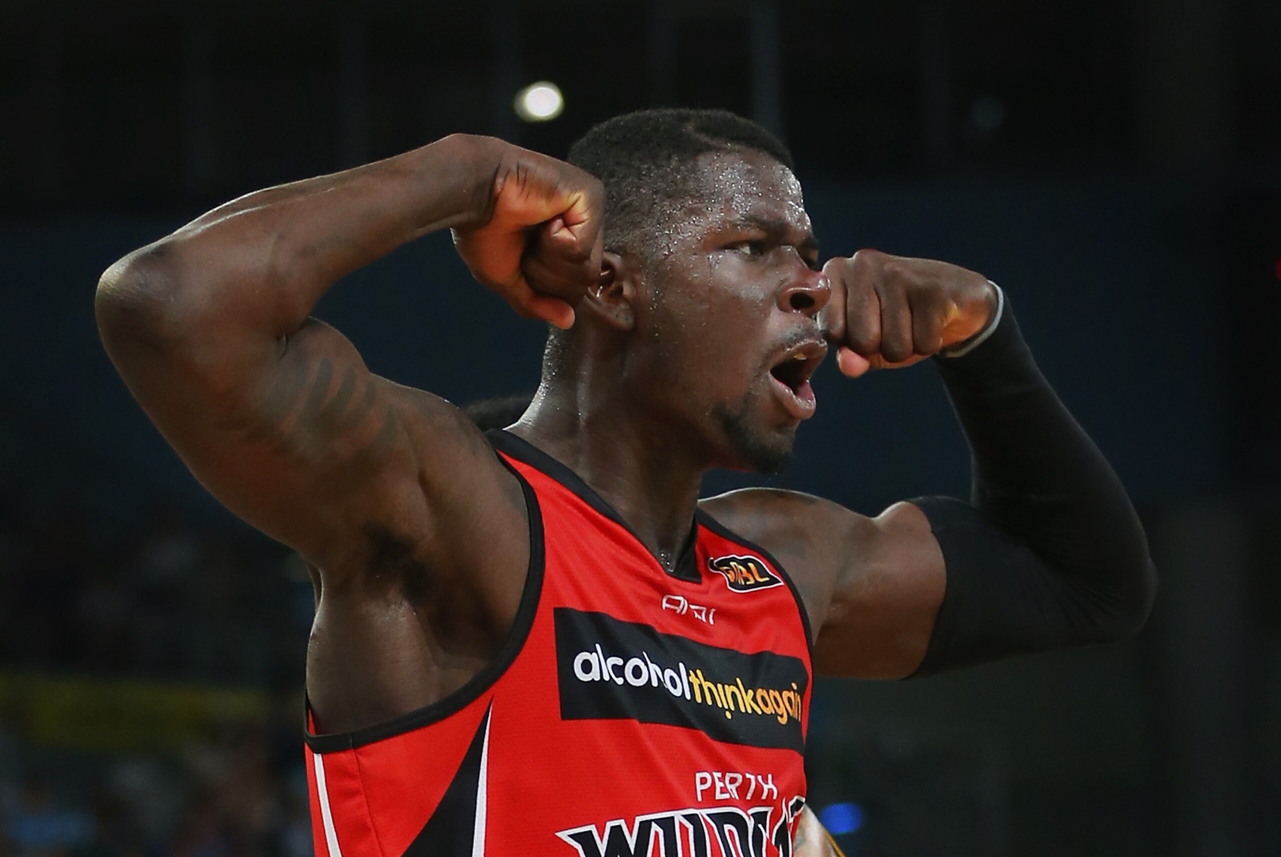 MELBOURNE, AUSTRALIA - FEBRUARY 02:  James Ennis of the Wildcats celebrates after shooting a basket during the round 16 NBL match between the Melbourne Tigers and the Perth Wildcats at Hisense Arena on February 2, 2014 in Melbourne, Australia.  (Photo by Scott Barbour/Getty Images)