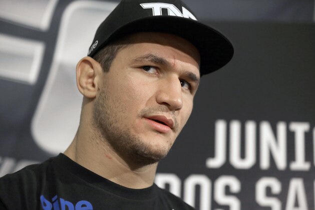 Former UFC heavyweight champion Junior Dos Santos, answers questions during a media availability Thursday, Oct. 17, 2013, in Houston. Santos will face UFC heavyweight champion Cain Velasquez in a rematch in Houston Saturday. Velasquez beat Santos in a five-round decision in December to regain the title after Santos won in a knockout in the first meeting in 2011. (AP Photo/Pat Sullivan) Former UFC heavyweight champion Junior Dos Santos, answers questions during a media availability Thursday, Oct. 17, 2013, in Houston. Santos will face UFC heavyweight champion Cain Velasquez in a rematch in Houston Saturday. Velasquez beat Santos in a five-round decision in December to regain the title after Santos won in a knockout in the first meeting in 2011. (AP Photo/Pat Sullivan)