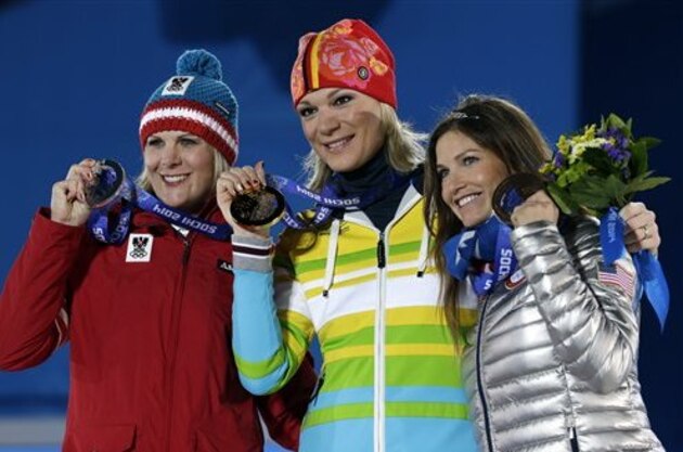 Women's super combined medalists, from left, Nicole Hosp of Austria, silver, Maria Hoefl-Riesch of Germany, gold, and Julia Mancuso of the United States, bronze, pose with their medals at the 2014 Winter Olympics in Sochi, Russia, Monday, Feb. 10, 2014. (AP Photo/Morry Gash)