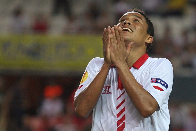 Sevilla's Carlos Bacca, celebrates after scoring a goal during a Europa League group H soccer match against Freiburg at the Ramon Sanchez Pizjuan stadium in Sevilla, Spain, Thursday, Oct. 3, 2013.  (AP Photo/Toni Rodriguez)