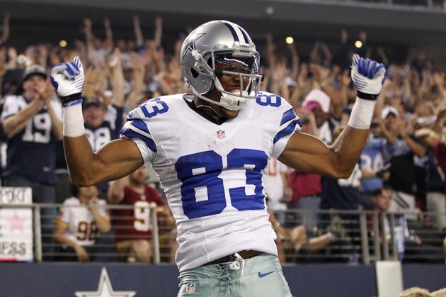 Oct 13, 2013; Arlington, TX, USA; Dallas Cowboys wide receiver Terrance Williams (83) celebrates making a touchdown catch in the third quarter of the game Washington Redskins  at AT&T Stadium. Mandatory Credit: Tim Heitman-USA TODAY Sports