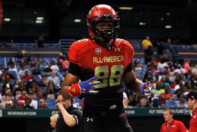 Jan 2, 2014; St. Petersburg, FL, USA; Team Highlight tight end Jacory Washington (88) gets introduced before the game at Tropicana Field. Mandatory Credit: Kim Klement-USA TODAY Sports