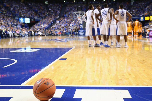 LEXINGTON, KY - JANUARY 18:  The Kentucky Wildcats talk during a break in play during the game against the Tennessee Volunteers at Rupp Arena on January 18, 2014 in Lexington, Kentucky.  (Photo by Andy Lyons/Getty Images)