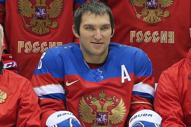 SOCHI, RUSSIA - FEBRUARY 10: (L-R) Alex Ovechkin #8, Head coach Zinetula Bilyaletdinov, and Pavel Datsyuk #13 of the Russian Federation pose during a team photo session on day three of the Sochi 2014 Winter Olympics at Bolshoy Arena on February 10, 2014 in Sochi, Russia.  (Photo by Bruce Bennett/Getty Images)