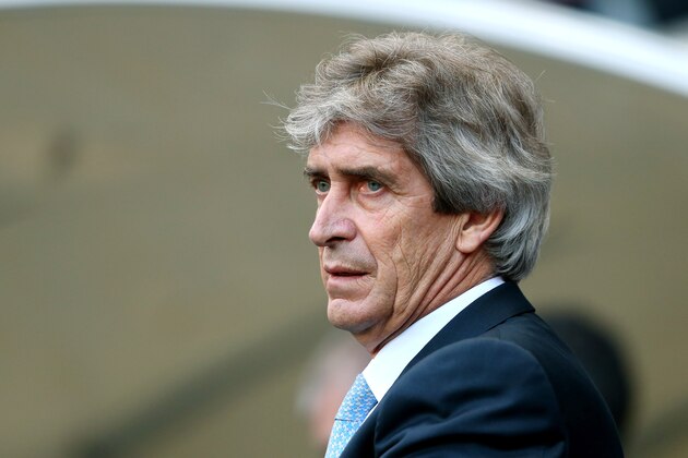 MANCHESTER, ENGLAND - JANUARY 18:  Manuel Pellegrini the Manchester City manager looks on during the Barclays Premier League match between Manchester City and Cardiff City at the Etihad Stadium on January 18, 2014 in Manchester, England.  (Photo by Alex Livesey/Getty Images)