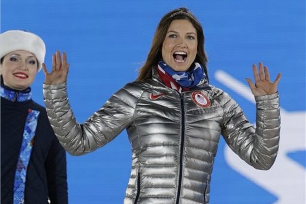 Women's super combined bronze medalist Julia Mancuso of the United States waves during the medals ceremony at the 2014 Winter Olympics, Monday, Feb. 10, 2014, in Sochi, Russia. (AP Photo/Morry Gash)