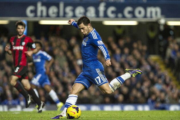 Chelsea's Eden Hazard tries to score against West Bromwich Albion, during their English Premier League soccer match, at the Stamford Bridge stadium in London, Saturday, Nov. 9, 2013. (AP Photo/Bogdan Maran)