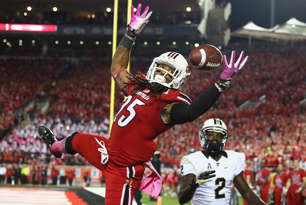 LOUISVILLE, KY - OCTOBER 18:  Calvin Pryor #25 of the Louisville Cardinals intercepts a pass in the end zone during the game against the Central Florida Knights at Papa John's Cardinal Stadium on October 18, 2013 in Louisville, Kentucky.  (Photo by Andy Lyons/Getty Images)