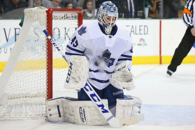 DALLAS, TX - JANUARY 23:  Jonathan Bernier #45 of the Toronto Maple Leafs makes a save against the Dallas Stars in the first period at American Airlines Center on January 23, 2014 in Dallas, Texas.  (Photo by Ronald Martinez/Getty Images)