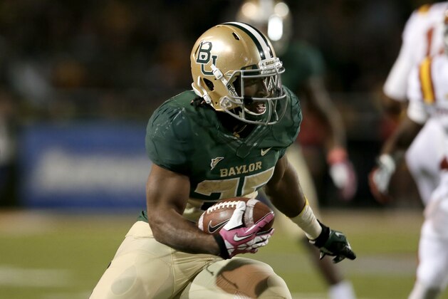 Baylor running back Lache Seastrunk (25) finds running room against Iowa State in the first half of an NCAA college football game, Saturday, Oct. 19, 2013, in Waco, Texas. Baylor won 71-7. (AP Photo/Tony Gutierrez)