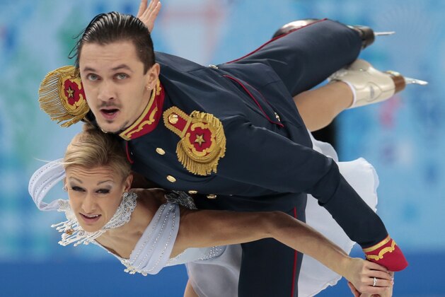 Tatiana Volosozhar and Maxim Trankov of Russia compete in the team pairs short program figure skating competition at the Iceberg Skating Palace during the 2014 Winter Olympics, Thursday, Feb. 6, 2014, in Sochi, Russia. (AP Photo/Ivan Sekretarev) Tatiana Volosozhar and Maxim Trankov of Russia compete in the team pairs short program figure skating competition at the Iceberg Skating Palace during the 2014 Winter Olympics, Thursday, Feb. 6, 2014, in Sochi, Russia. (AP Photo/Ivan Sekretarev)