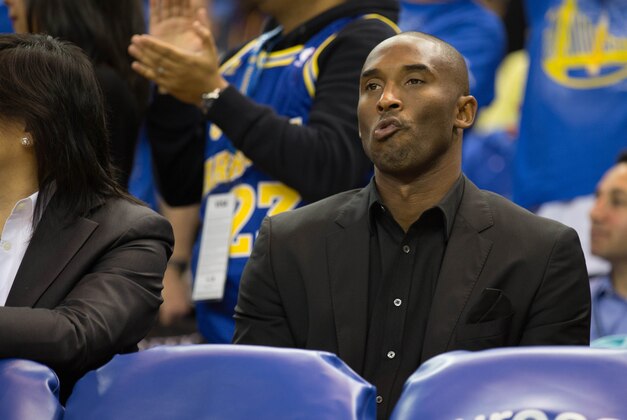 Oct 30, 2013; Oakland, CA, USA; Los Angeles Lakers shooting guard Kobe Bryant (24) behind the bench against the Golden State Warriors during the third quarter at Oracle Arena. The Golden State Warriors defeated the Los Angeles Lakers 125-94. Mandatory Credit: Kelley L Cox-USA TODAY Sports