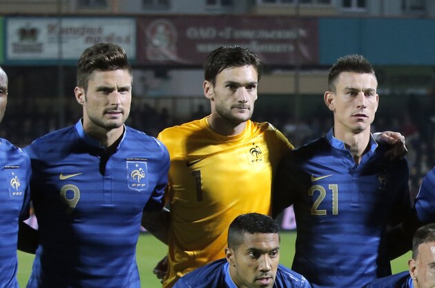 France's team line up, back from left to right, Eric Abidal, France's Olivier Giroud, Hugo Lloris, Laurent Koscielny, Bacary Sagna, Paul Pogba, front from left to right, Gael Clichy, Franck Ribery, Mathieu Valbuena, Blaise Matuidi, Dimitri Payet, during their World Cup Group I, qualifying soccer match in Gomel, Belarus, Tuesday, Sept. 10, 2013. (AP Photo/Sergei Grits)