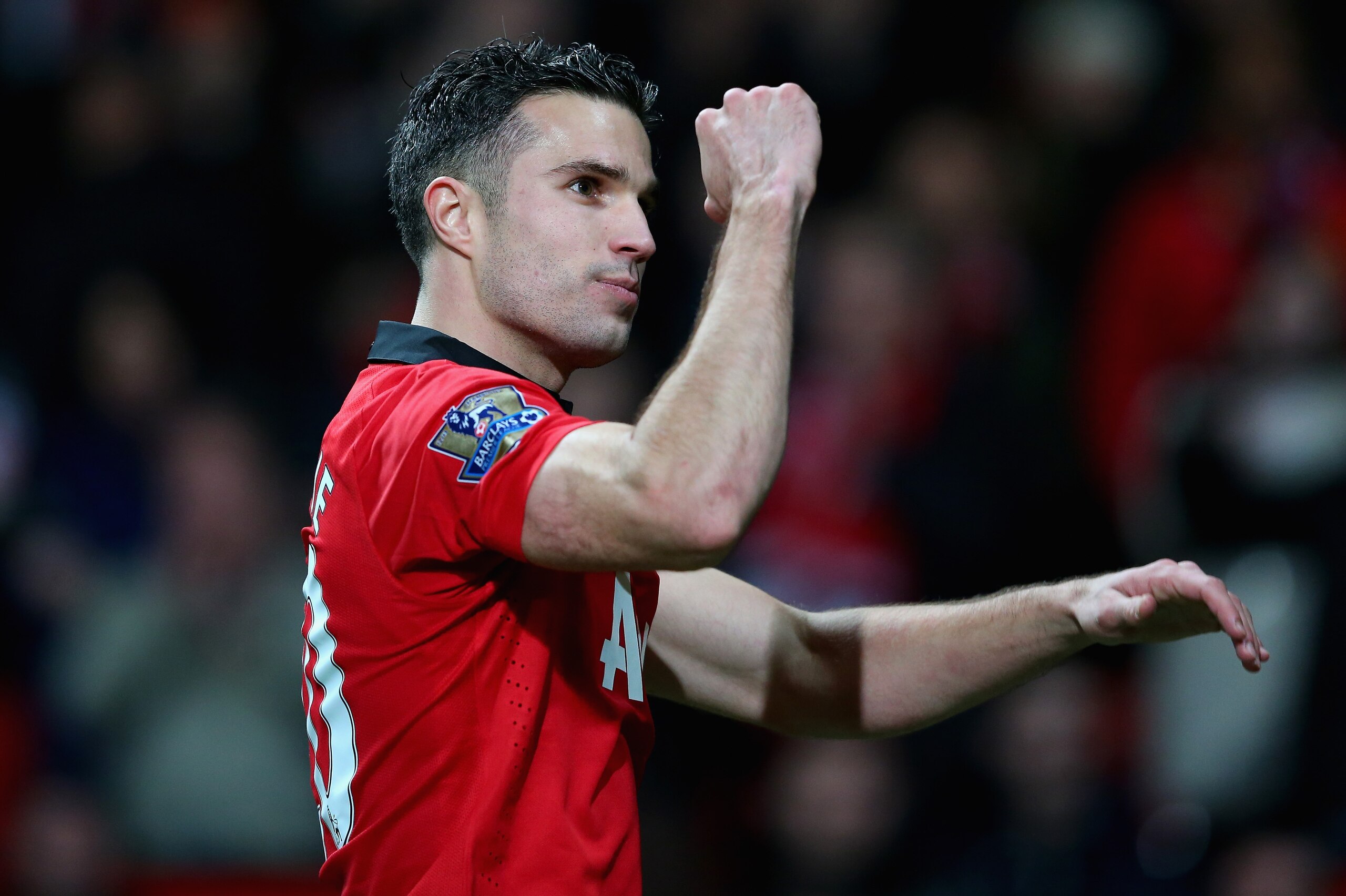 MANCHESTER, ENGLAND - NOVEMBER 10:  Robin van Persie of Manchester United celebrates at the end of the Barclays Premier League match between Manchester United and Arsenal at Old Trafford on November 10, 2013 in Manchester, England.  (Photo by Alex Livesey/Getty Images)