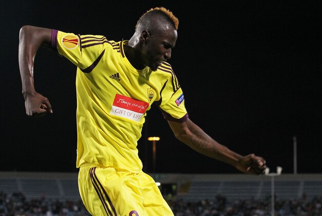 Anzhi's Lacina Traore' celebrates after scoring during an Europa League Group A soccer match between Udinese and Anzhi, in Udine, Italy, Thursday, Sept. 20, 2012. (AP Photo/Paolo Giovannini)