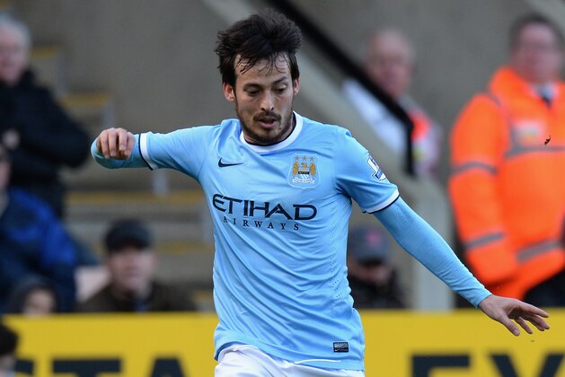 NORWICH, ENGLAND - FEBRUARY 08:  David Silva of Manchester City  during the Barclays Premier League match between Norwich City and Manchester City  at Carrow Road on February 8, 2014 in Norwich, England.  (Photo by Tony Marshall/Getty Images)