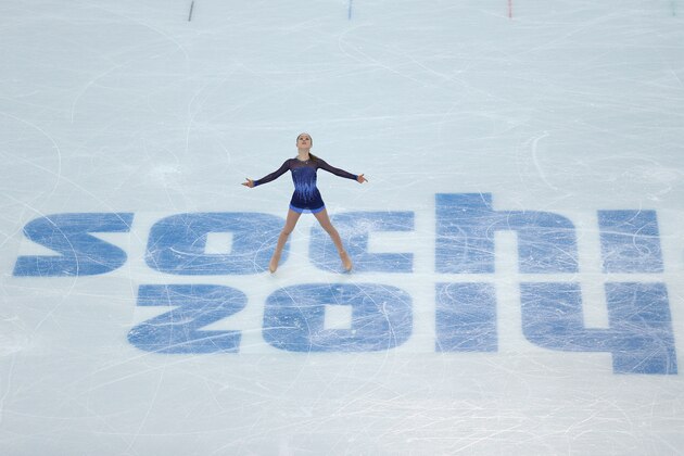 SOCHI, RUSSIA - FEBRUARY 08:  Yulia Lipnitskaya of Russia competes in the Figure Skating Team Ladies Short Program during day one of the Sochi 2014 Winter Olympics at Iceberg Skating Palace on February 8, 2014 in Sochi, Russia.  (Photo by Matthew Stockman/Getty Images)