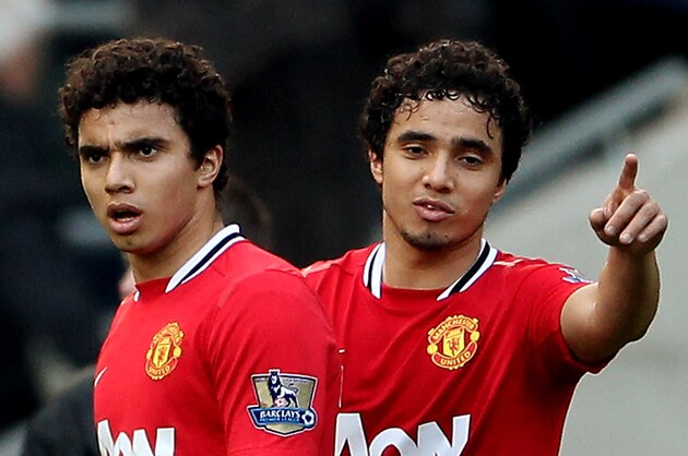 WOLVERHAMPTON, ENGLAND - MARCH 18:  Fabio Da Silva (L) and Rafael Da Silva during the Barclays Premier League Match between Wolverhampton Wanderers and Manchester United at Molineux on March 18, 2012 in Wolverhampton, England.  (Photo by Scott Heavey/Getty Images)