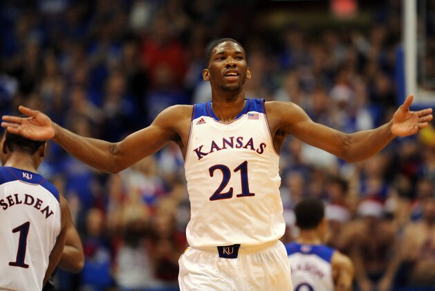 Dec 21, 2013; Lawrence, KS, USA; Kansas Jayhawks center Joel Embiid (21) celebrates after scoring during the second half of the game against the Georgetown Hoyas at Allen Fieldhouse. Kansas won 86-64. Mandatory Credit: Denny Medley-USA TODAY Sports