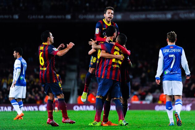 BARCELONA, SPAIN - FEBRUARY 05: FC Barcelona players celebrate after Sergio Busquets of FC Barcelona scores the opening goal during the Copa del Rey Semi-Final first leg match between Barcelona and Real Sociedad at Camp Nou on February 5, 2014 in Barcelona, Spain. (Photo by David Ramos/Getty Images) BARCELONA, SPAIN - FEBRUARY 05: FC Barcelona players celebrate after Sergio Busquets of FC Barcelona scores the opening goal during the Copa del Rey Semi-Final first leg match between Barcelona and Real Sociedad at Camp Nou on February 5, 2014 in Barcelona, Spain. (Photo by David Ramos/Getty Images)