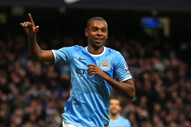 MANCHESTER, ENGLAND - DECEMBER 14:  Fernandinho of Manchester City celebrates scoring their fifth goal during the Barclays Premier League match between Manchester City and Arsenal at Etihad Stadium on December 14, 2013 in Manchester, England.  (Photo by Richard Heathcote/Getty Images)