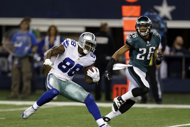 Dallas Cowboys wide receiver Dez Bryant (88) finds running room after grabbing  a pass as Philadelphia Eagles cornerback Cary Williams (26) gives chase during the second half of an NFL football game, Sunday, Dec. 29, 2013, in Arlington, Texas. (AP Photo/Tim Sharp)