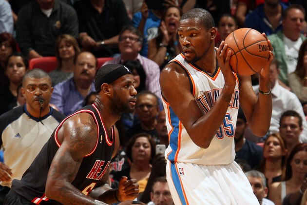 MIAMI, FL - JANUARY 29: Kevin Durant #35 of the Oklahoma City Thunder handles the ball against LeBron James #6 of the Miami Heat at the American Airlines Arena in Miami, Florida on Jan. 29, 2014. NOTE TO USER: User expressly acknowledges and agrees that, by downloading and/or using this photograph, user is consenting to the terms and conditions of the Getty Images License Agreement. Mandatory copyright notice: Copyright NBAE 2014 (Photo by Issac Baldizon/NBAE via Getty Images)